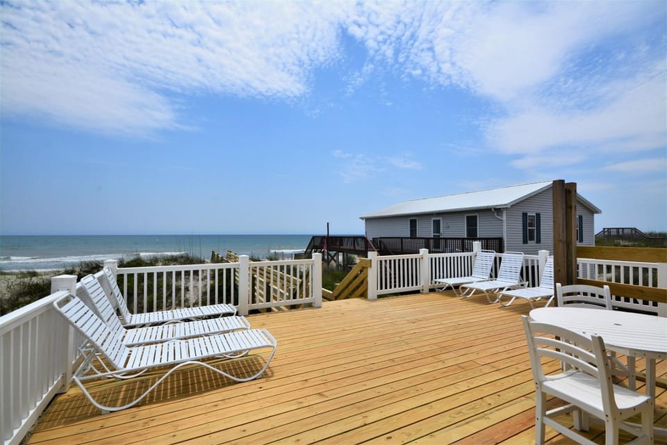 Discover oceanfront bliss at this 8 bedroom duplex in North Topsail Beach! House in North Topsail Beach