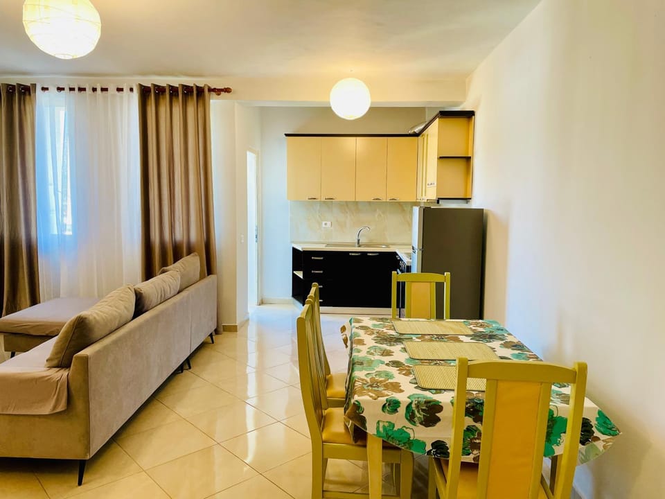 Kitchen or kitchenette, Living room, Seating area, Dining area