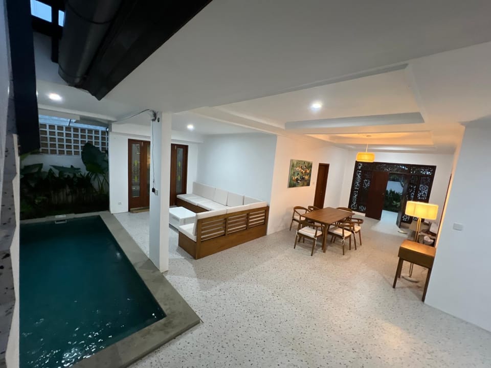 Living room, Seating area, Dining area, Pool view, Swimming pool, sunbed