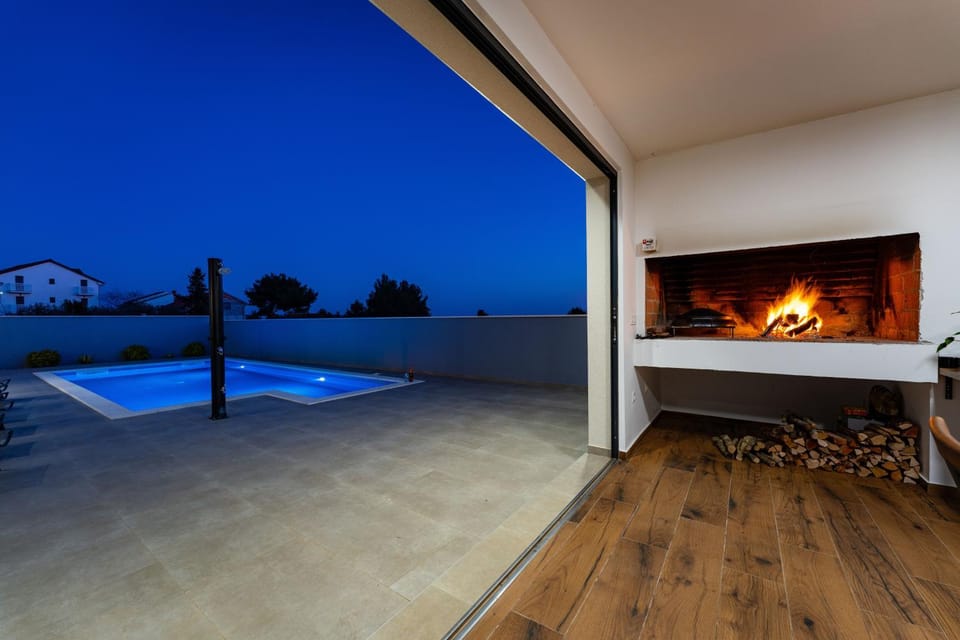 Patio, Night, Natural landscape, Evening entertainment, Pool view, Swimming pool, fireplace, sunbed