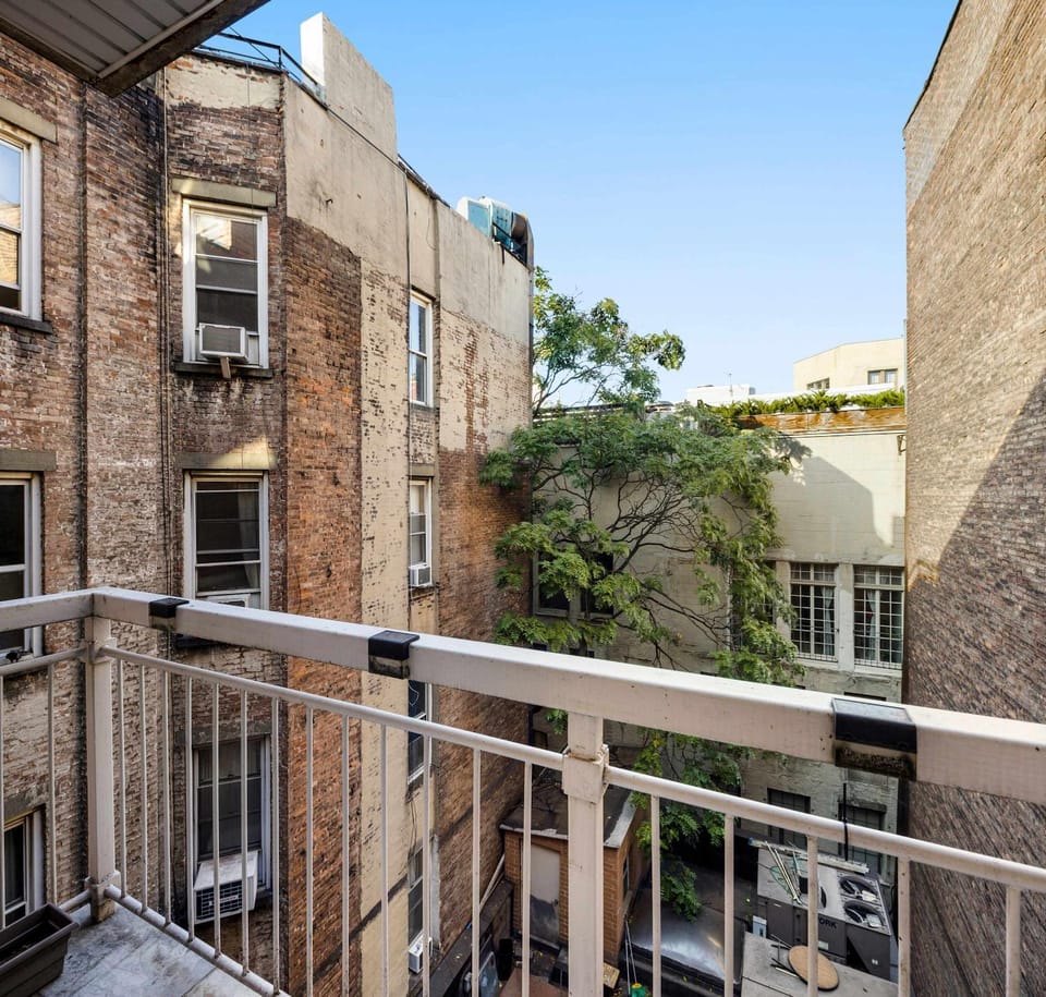 Cooper Terrace 1BR Light-Filled Loft with Balcony in Elevator Building Apartment in East Village