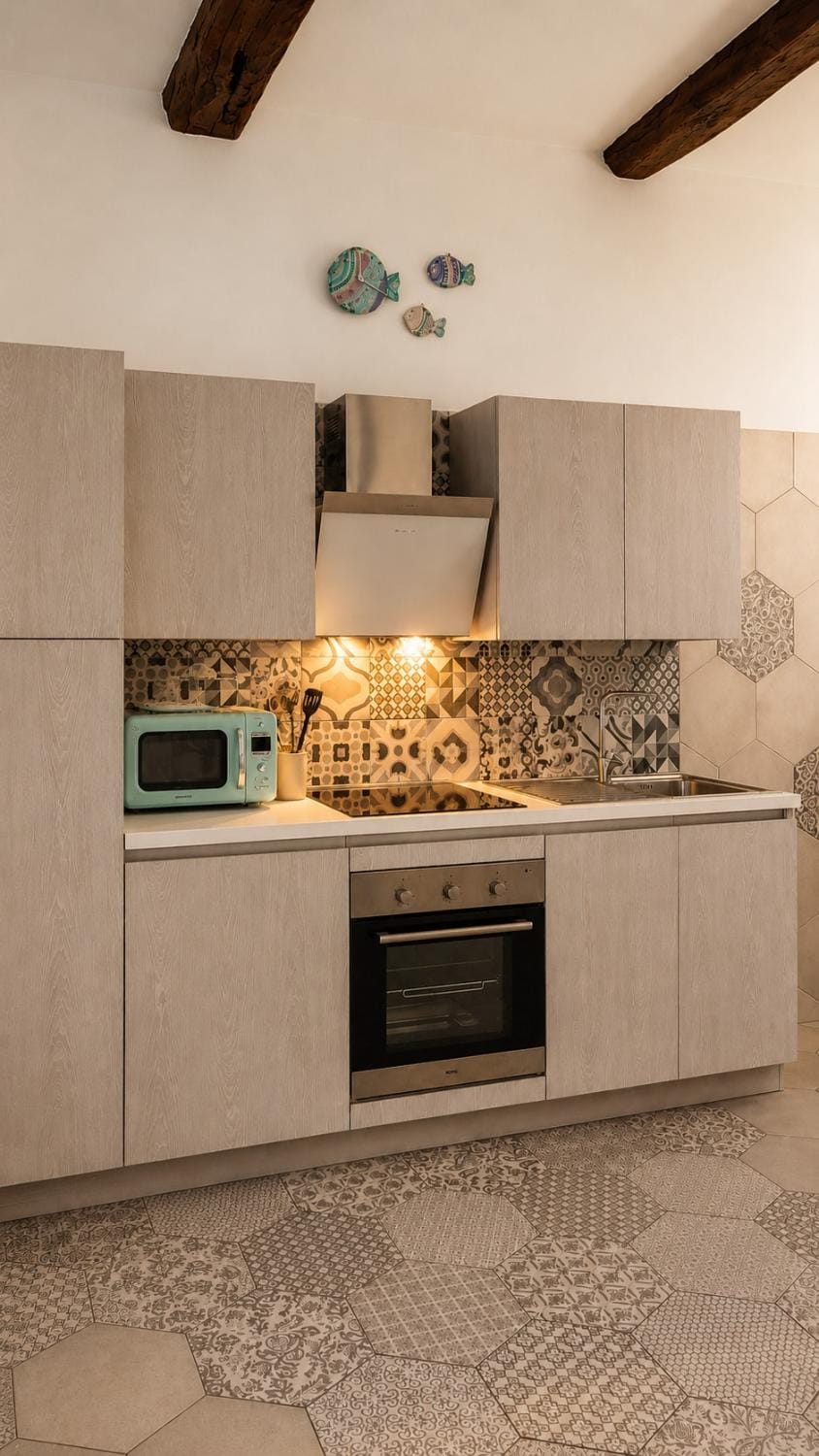 Kitchen or kitchenette, dishwasher, oven, stove, washing machine