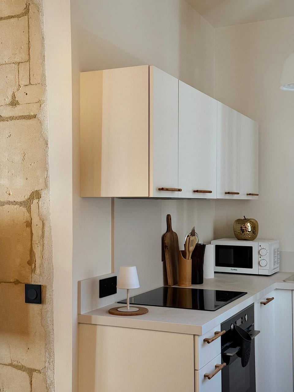 Kitchen or kitchenette, dishwasher, oven, stove