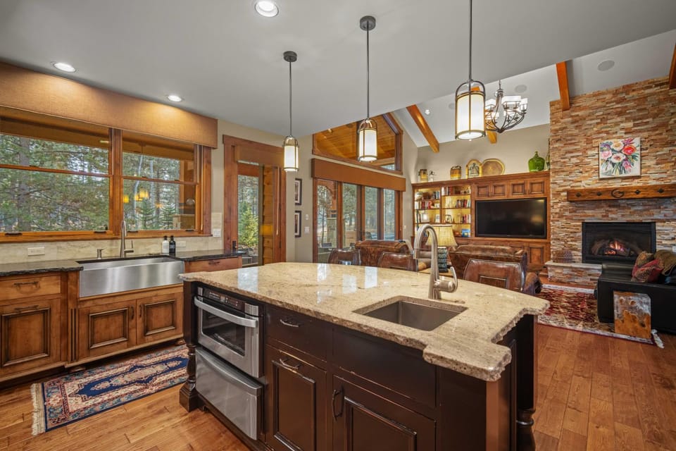 Kitchen or kitchenette, fireplace, furniture, microwave, oven, kitchen