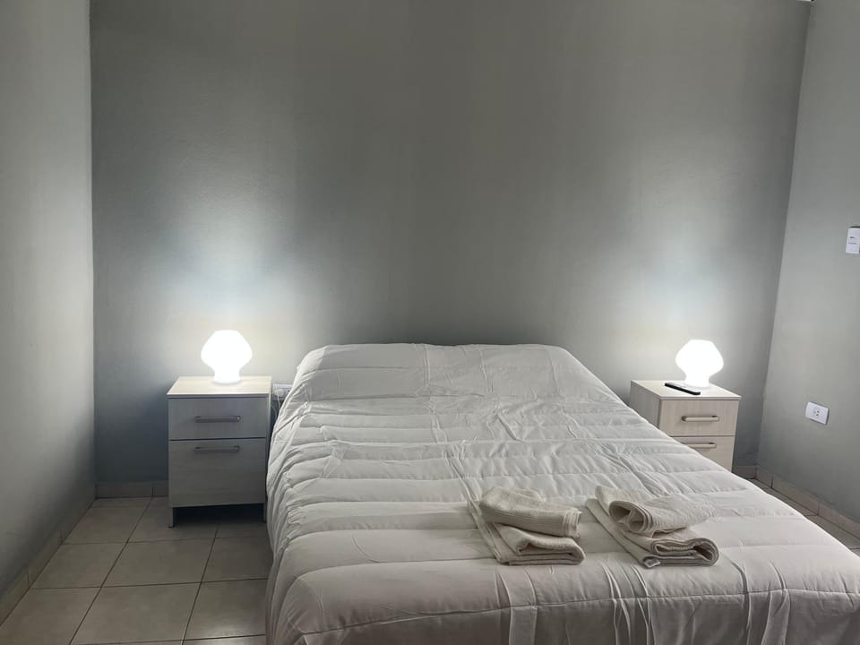 Bed, Photo of the whole room, Bedroom, towels, air conditioner