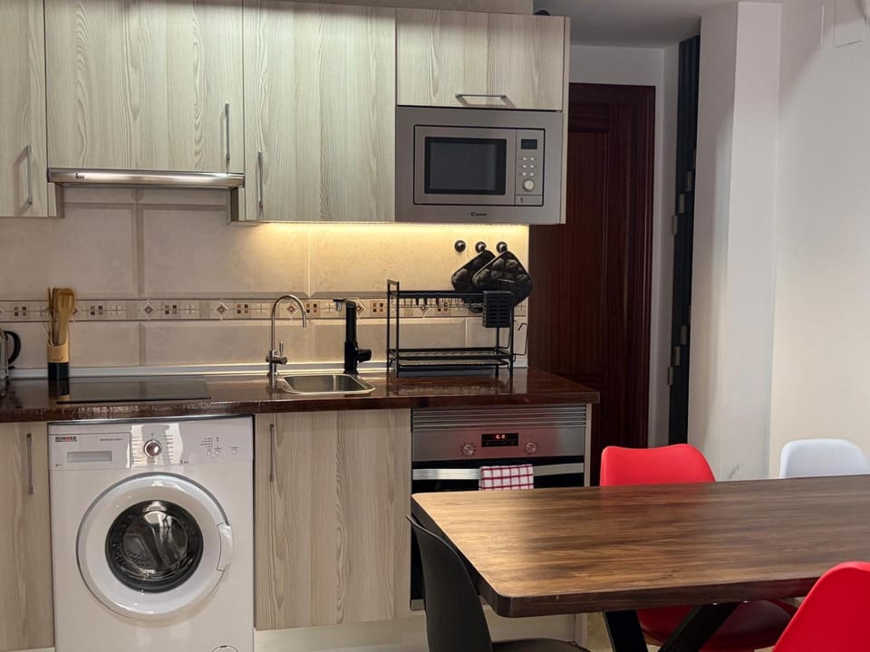 Kitchen or kitchenette, oven, stove, toaster