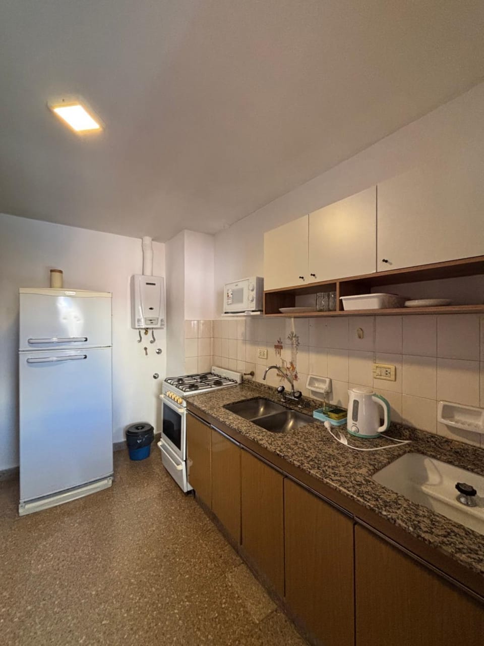 Kitchen or kitchenette, oven, stove