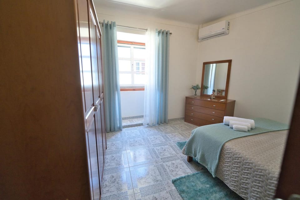 Bed, Bedroom, towels, wardrobe, air conditioner