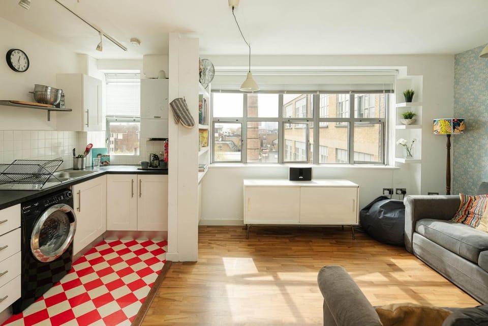 Kitchen or kitchenette, Living room, Seating area, stove, washing machine