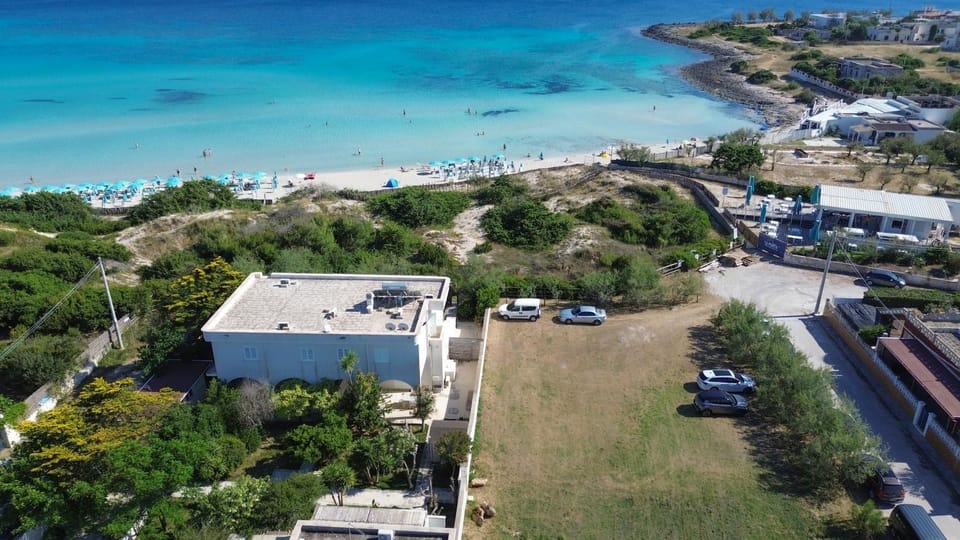 Property building, Natural landscape, Sea view, Street view, Parking