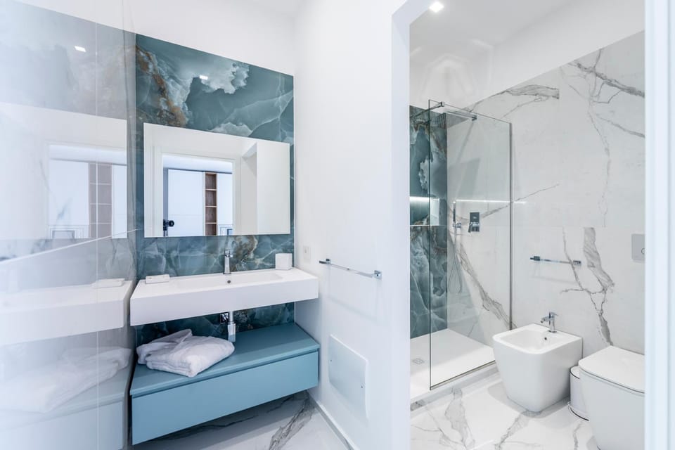 Shower, Toilet, Bathroom, bidet, hair dryier, towels