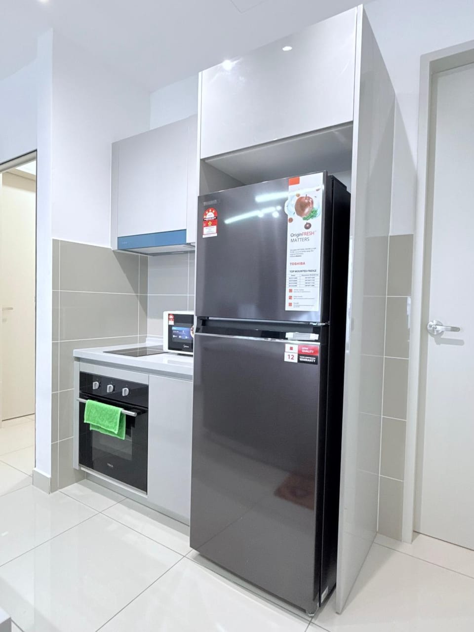 Kitchen or kitchenette, microwave, stove, kitchen