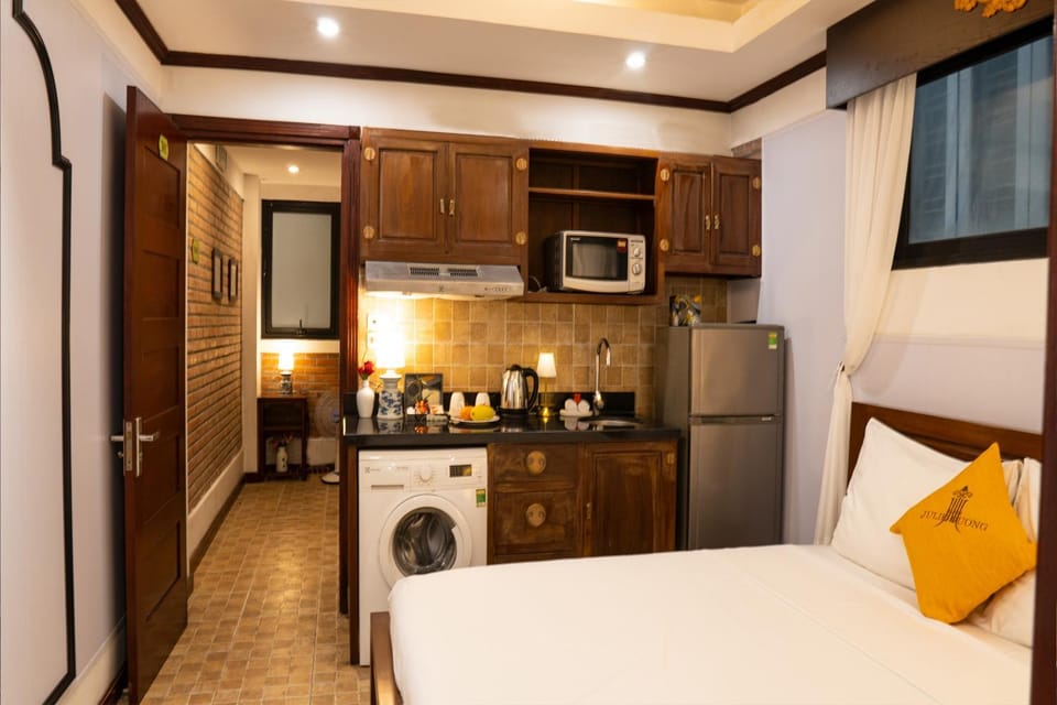 Property building, Coffee/tea facilities, Kitchen or kitchenette, Bedroom, minibar, toaster