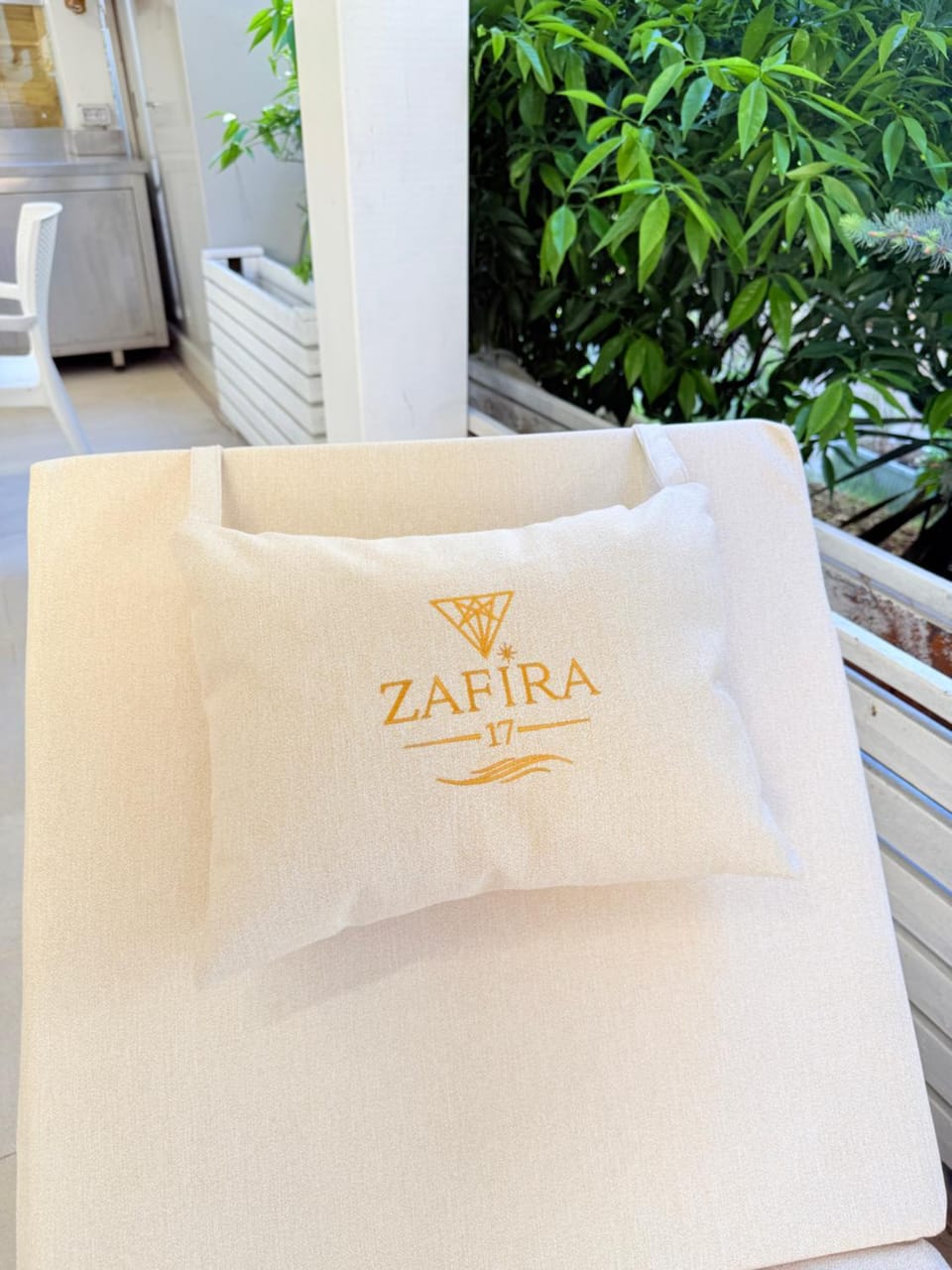 Day, Property logo or sign, Seating area