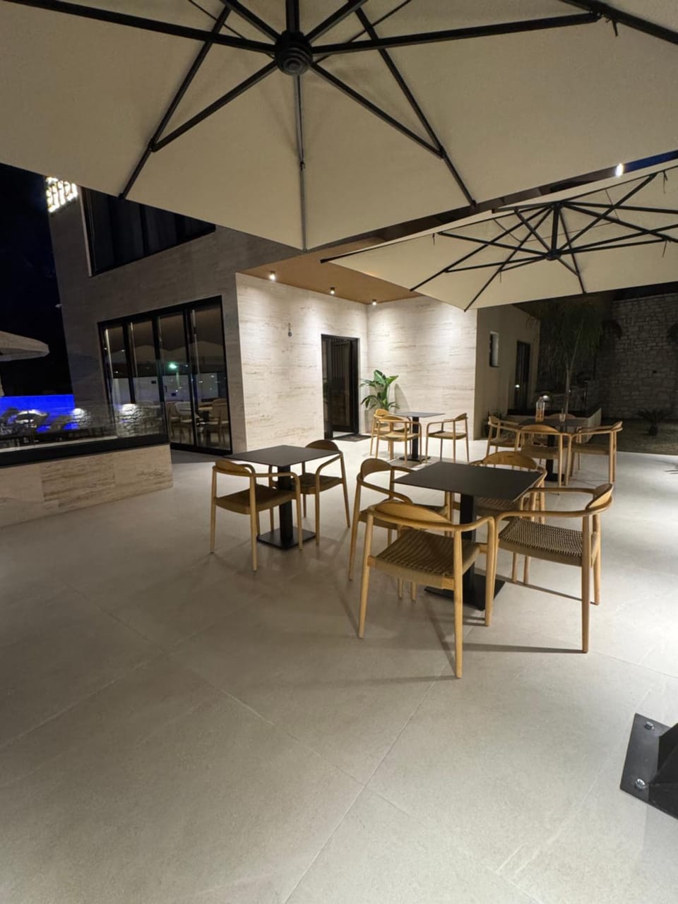 Patio, Night, Seating area, Pool view, Swimming pool, sunbed