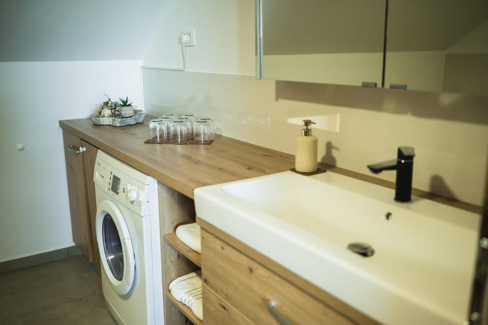 Toilet, Bathroom, towels, washing machine