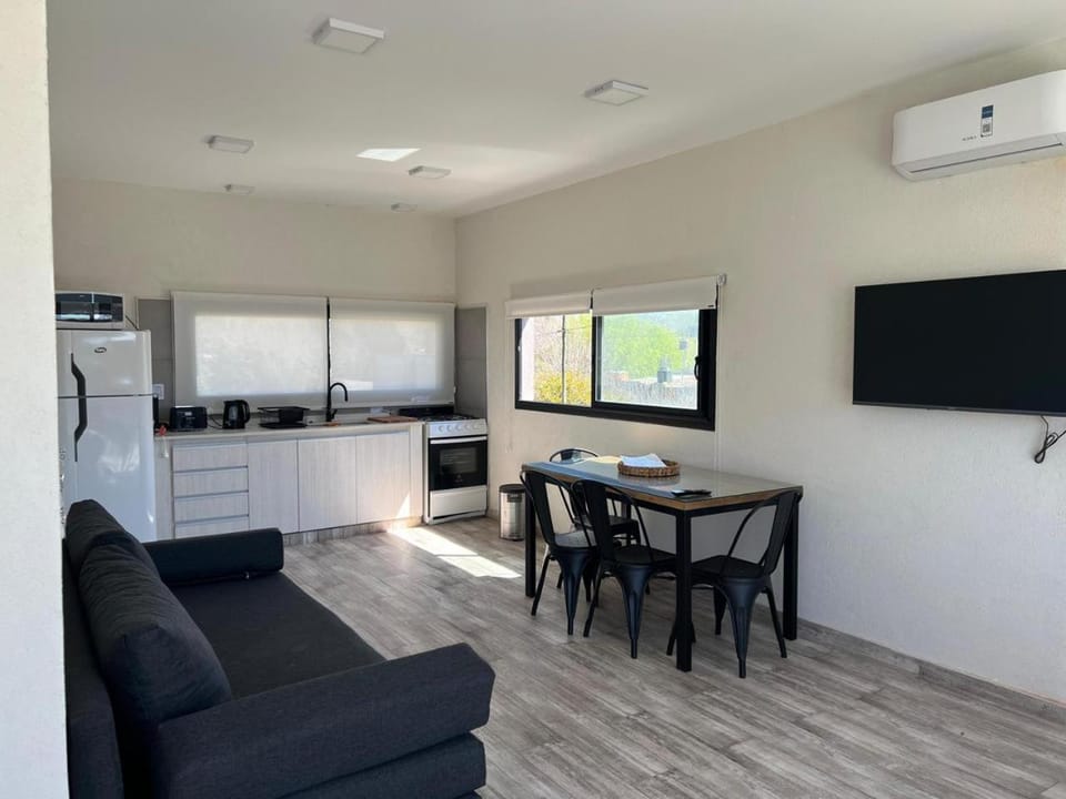 Kitchen or kitchenette, Living room, Seating area, Dining area