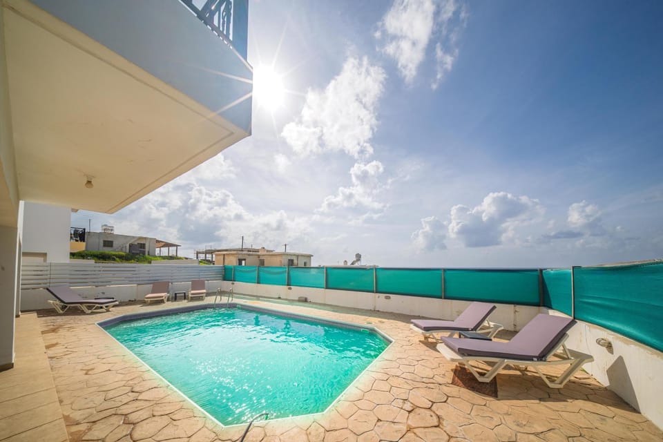 Patio, Day, Natural landscape, View (from property/room), Pool view, Swimming pool, sunbed