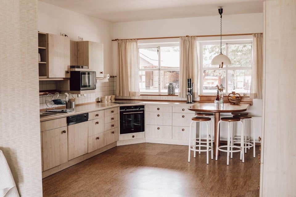 Dining area, dishwasher, stove, kitchen