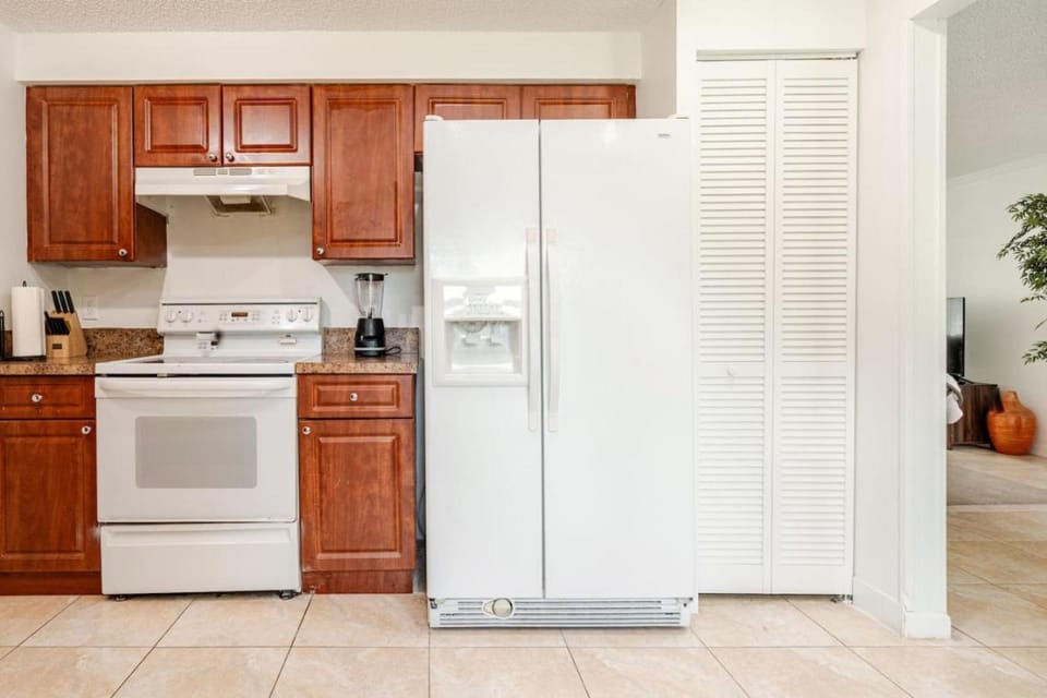 Kitchen or kitchenette, dishwasher, oven, stove, toaster