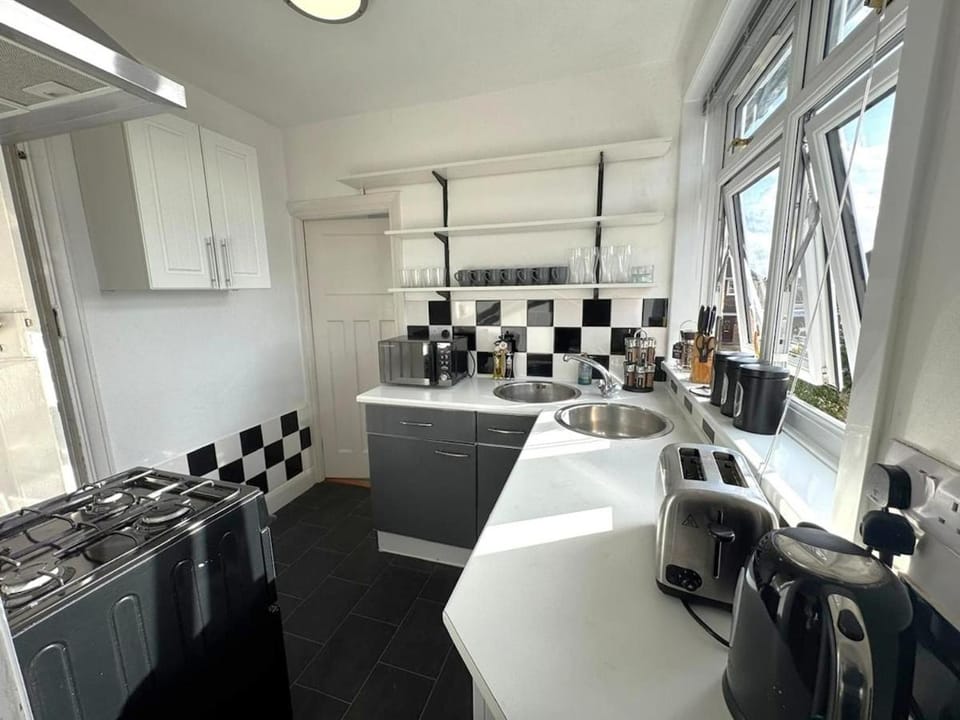 Kitchen or kitchenette, stove, toaster