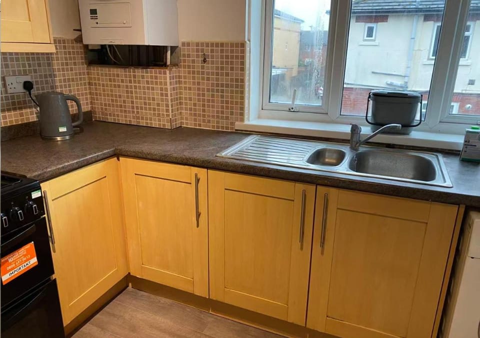 Kitchen or kitchenette, stove, toaster