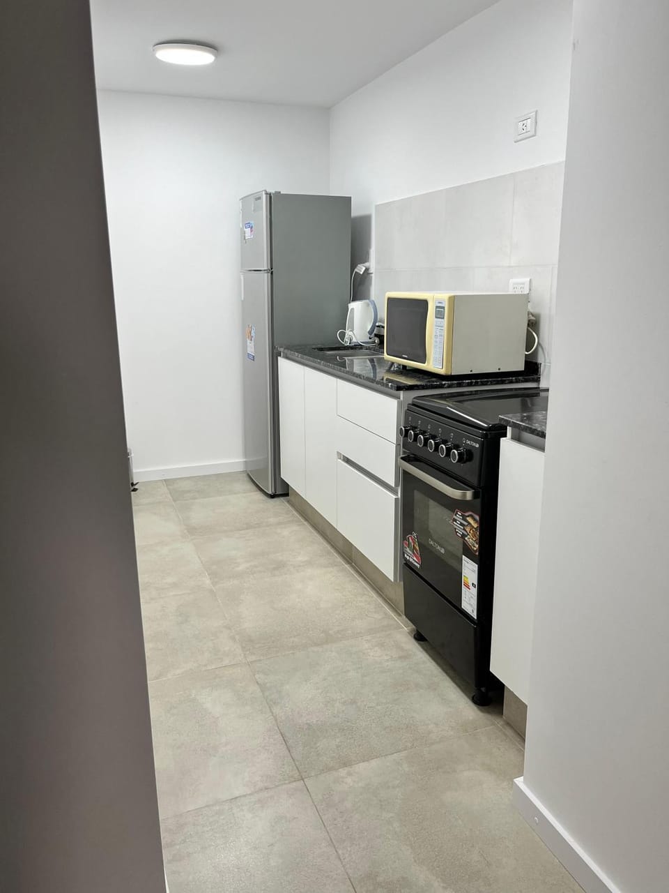 Kitchen or kitchenette, oven, toaster
