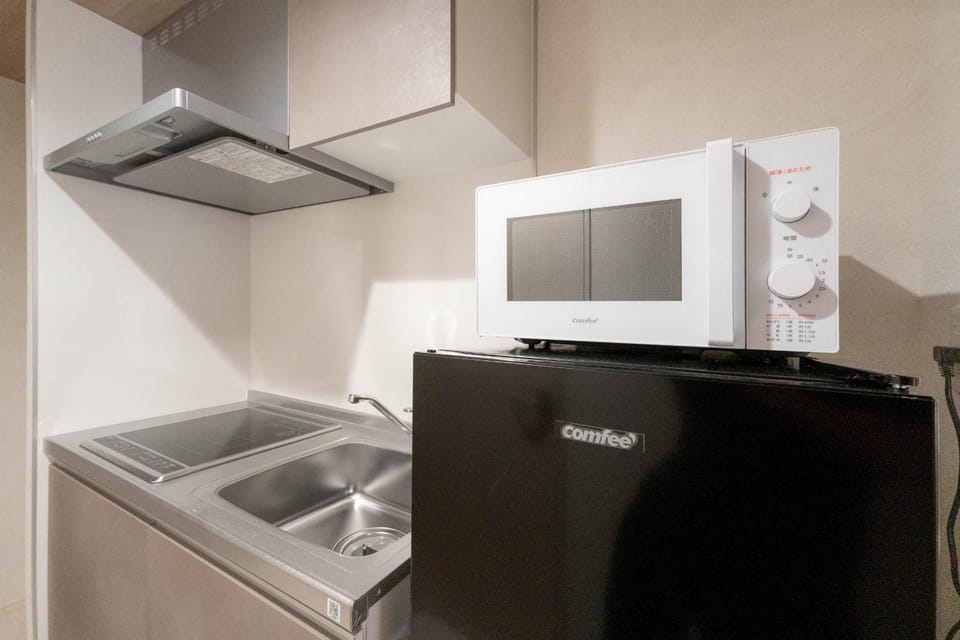 Kitchen or kitchenette, microwave