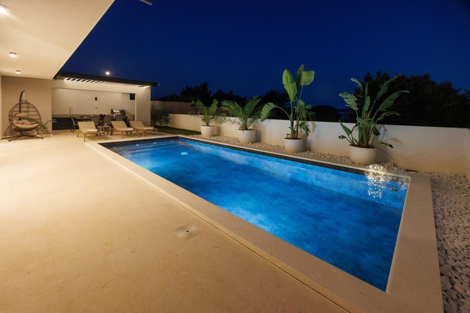 Night, Pool view, Swimming pool, sunbed