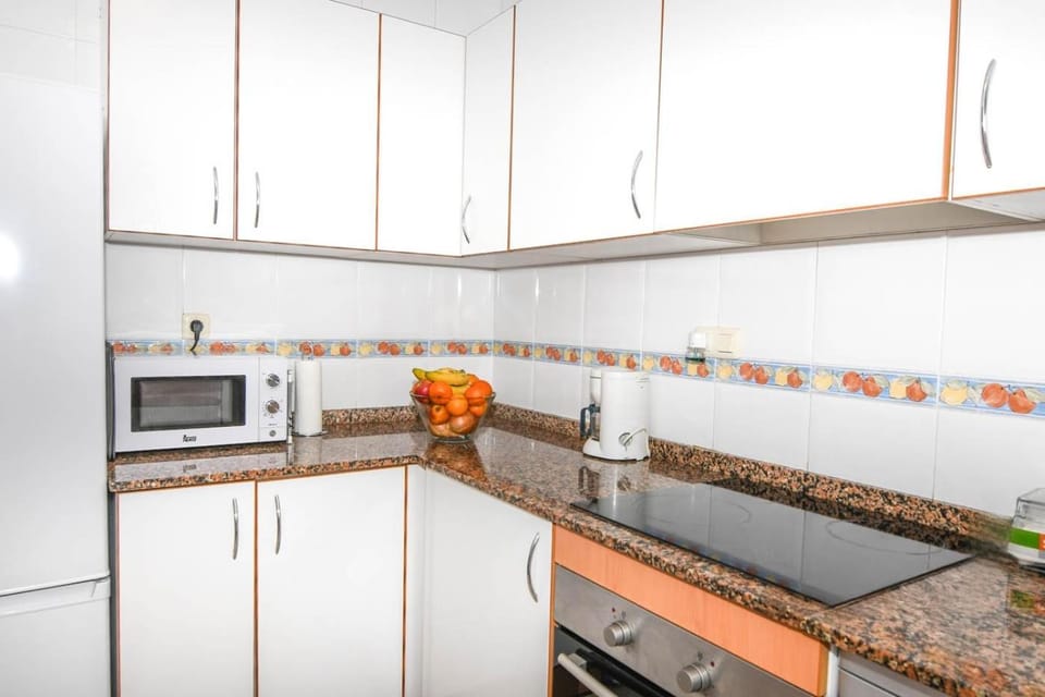 Kitchen or kitchenette, oven