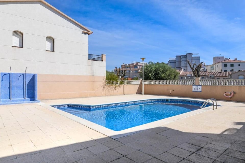 Property building, Pool view, Swimming pool, sunbed