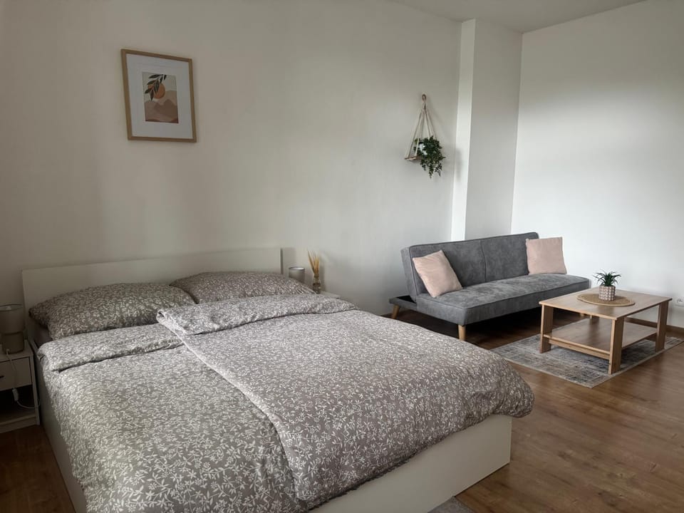 Bed, Living room, Seating area, Bedroom