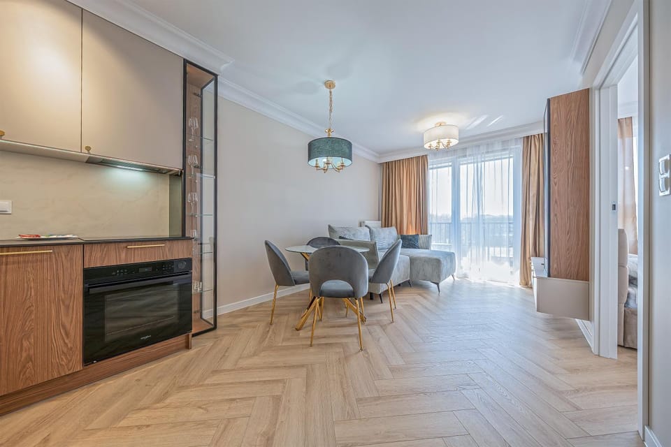 Kitchen or kitchenette, Living room, Seating area, Dining area