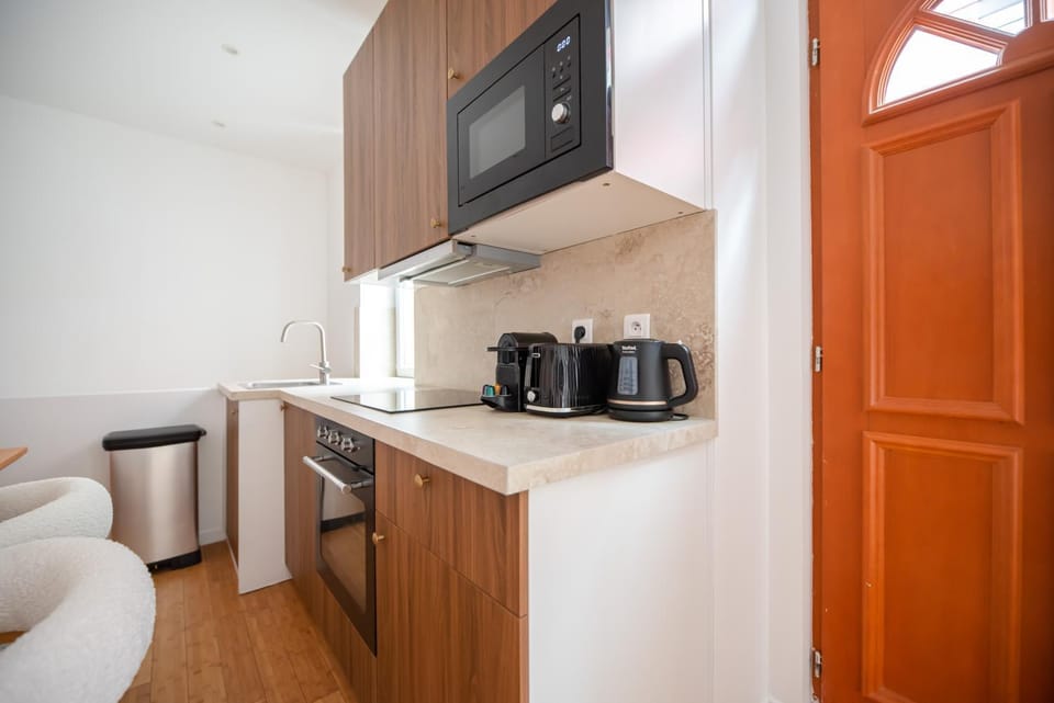 Kitchen or kitchenette, stove, toaster