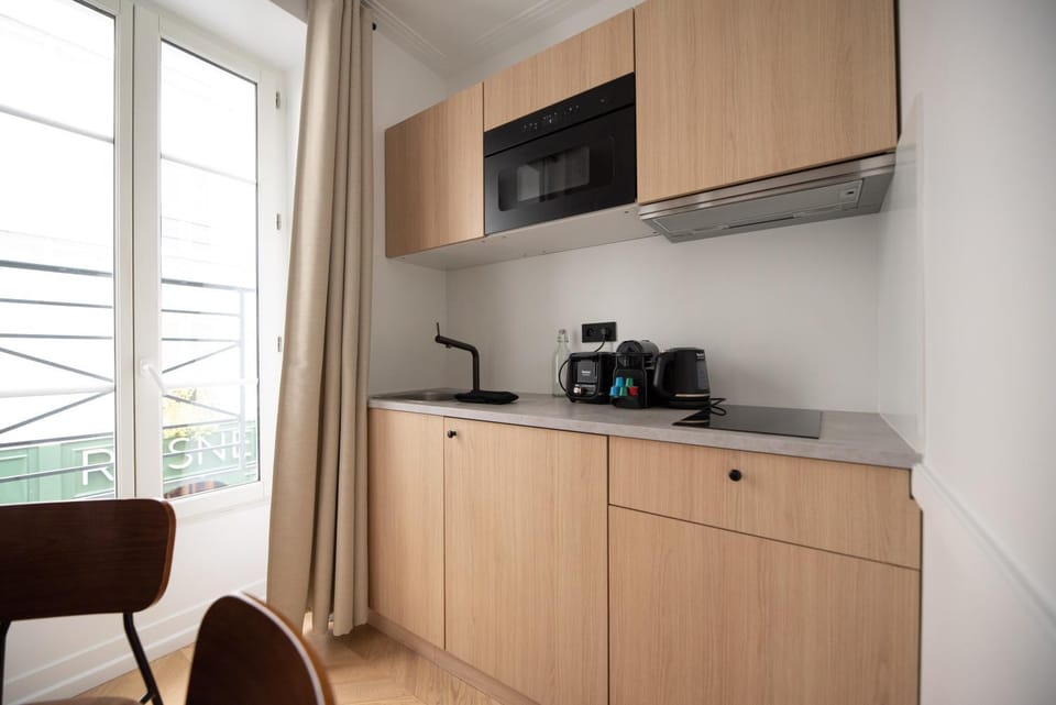 Kitchen or kitchenette, stove, toaster