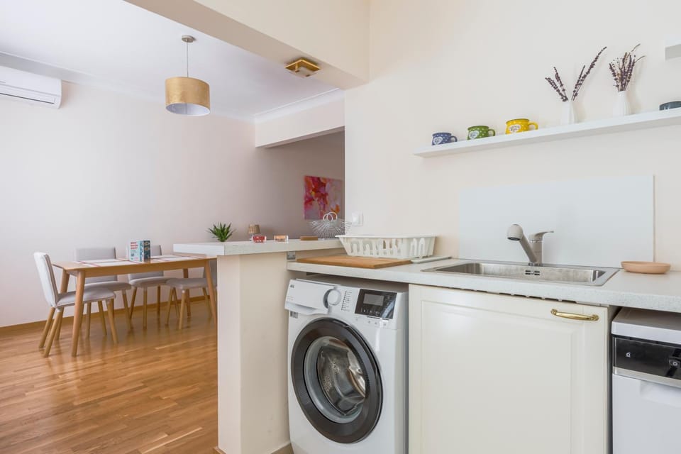 Kitchen or kitchenette, washing machine