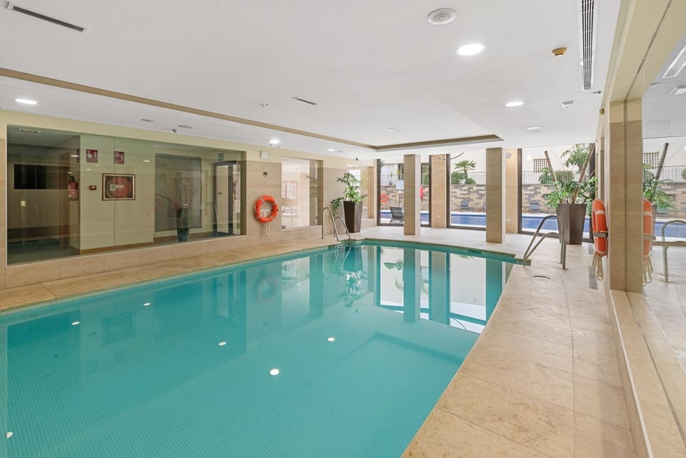 Property building, Living room, Swimming pool