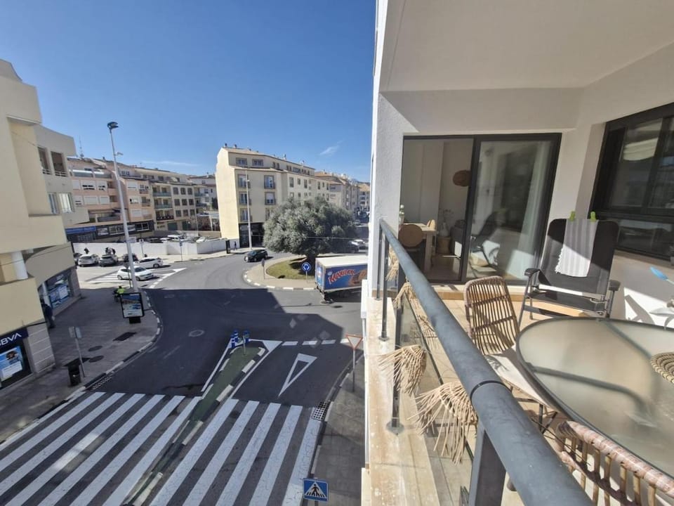 Property building, Patio, Day, Neighbourhood, View (from property/room), Balcony/Terrace, Seating area, City view, Street view, Location, Parking