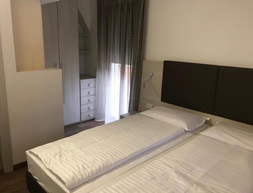 Bed, wardrobe