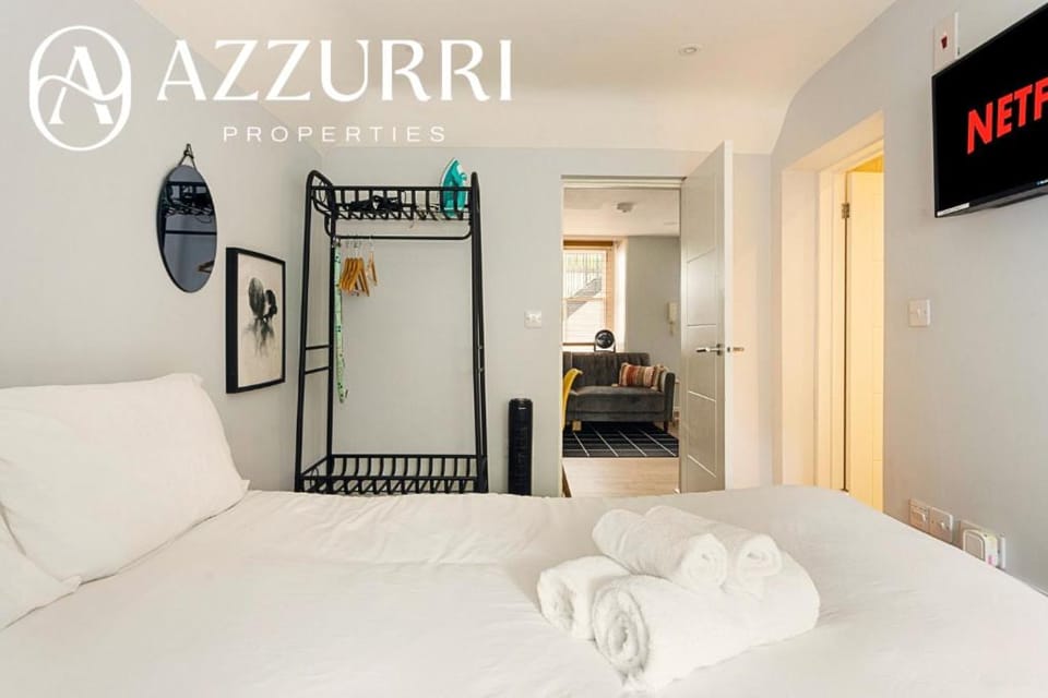 Bed, TV and multimedia, Bedroom, flat iron, hair dryier, towels