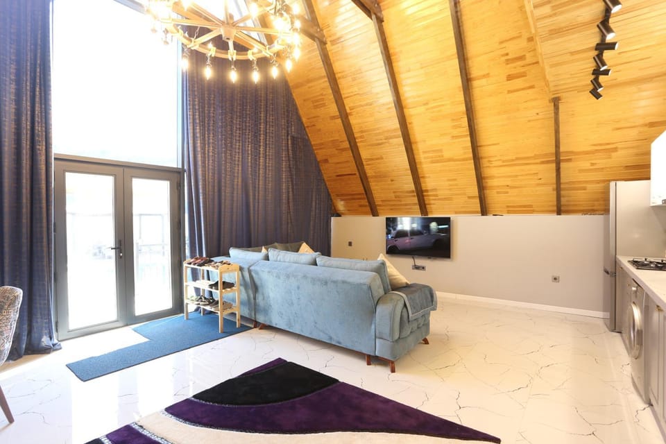 Communal lounge/ TV room, Living room, Seating area, Evening entertainment