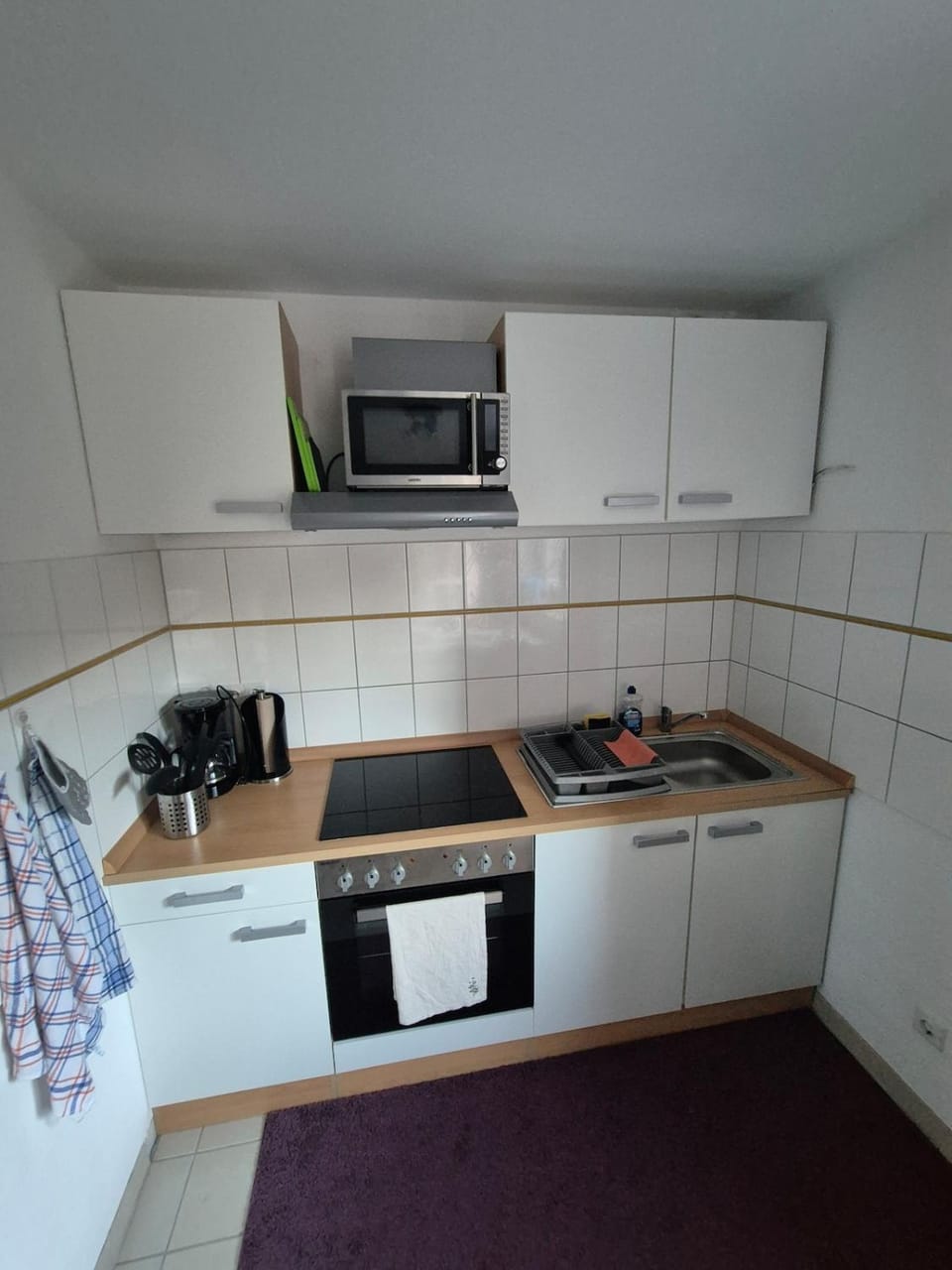 Kitchen or kitchenette, oven, stove, toaster