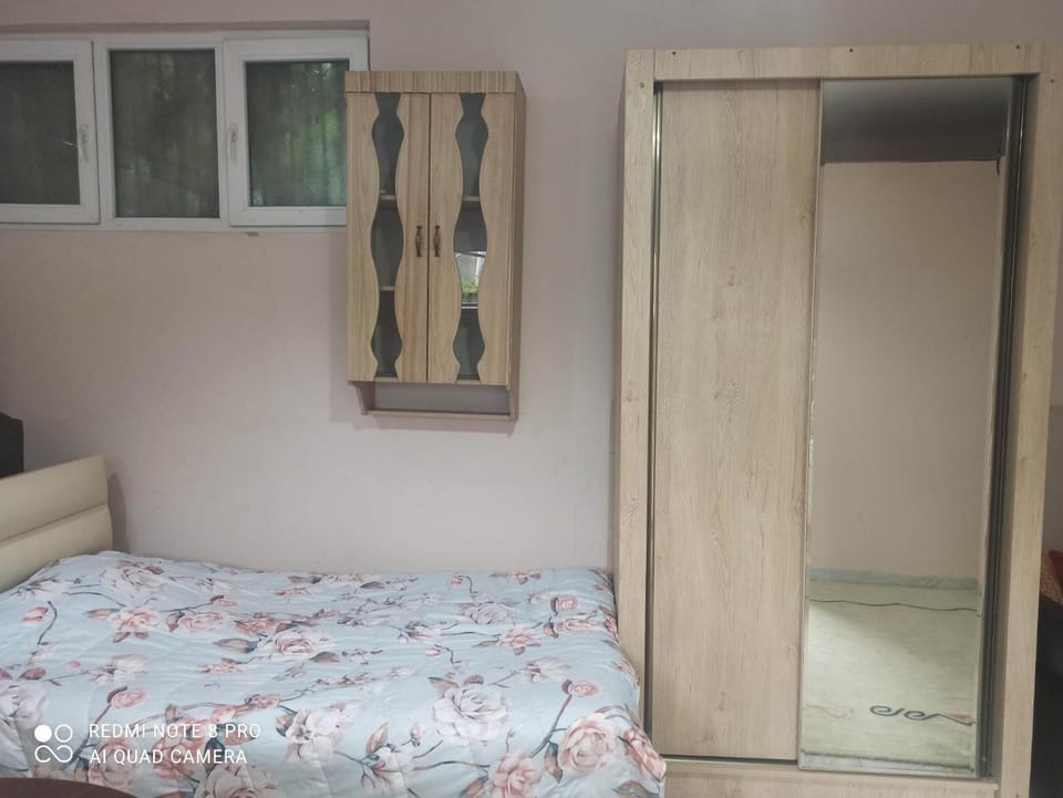 Bed, wardrobe