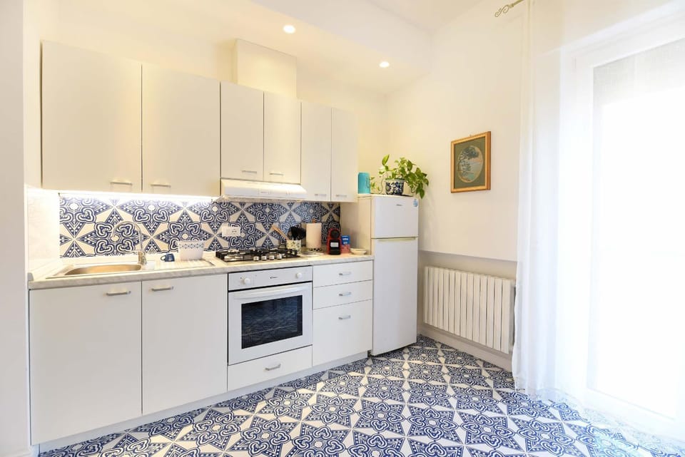 Kitchen or kitchenette, oven, stove