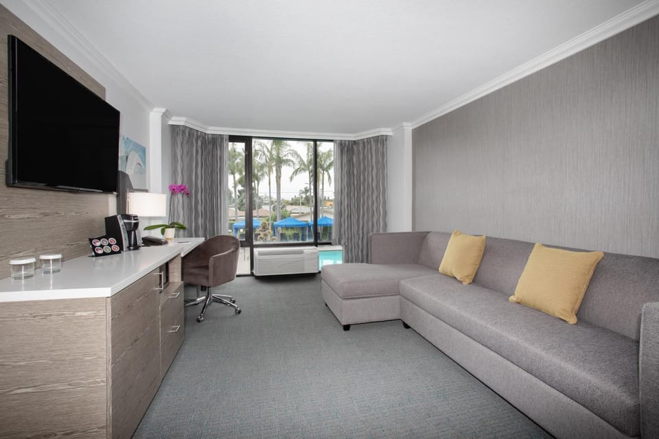 Living room, Seating area, Pool view