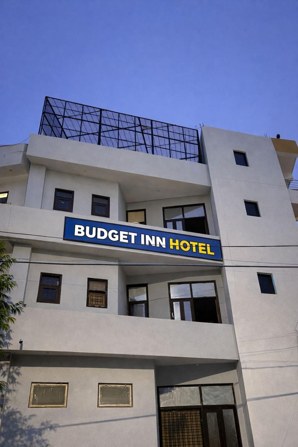 Budget Inn and The Cozy Cafe Hotel in Noida