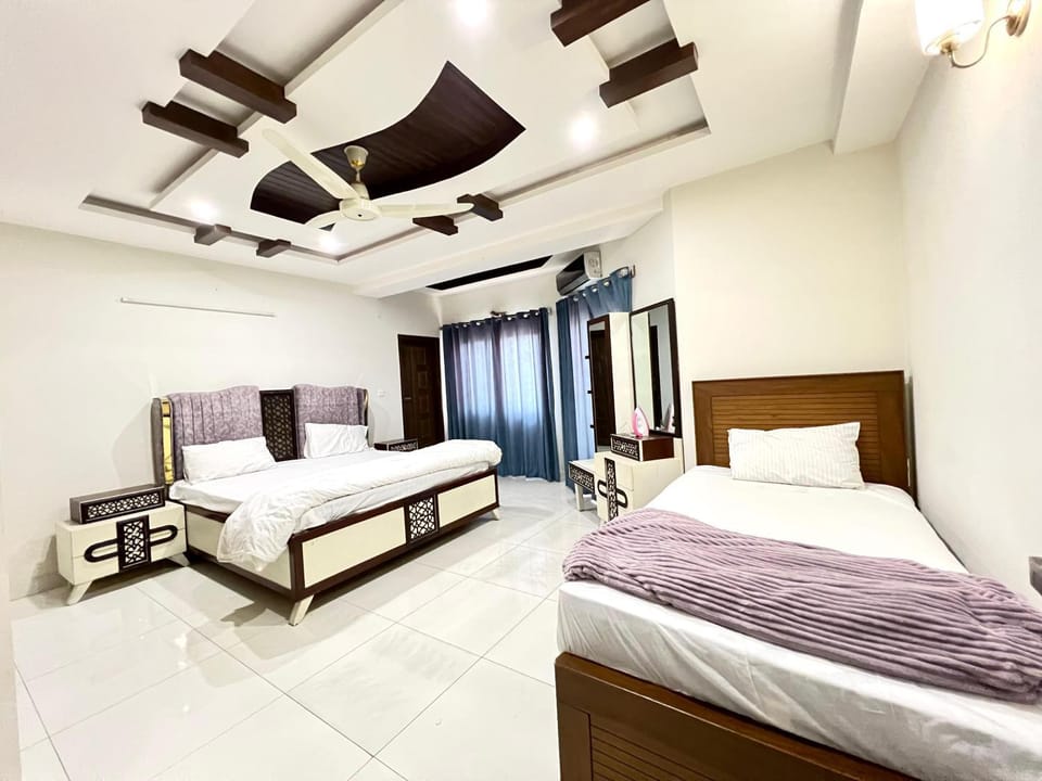 Bed, Bedroom, fireplace, towels, air conditioner