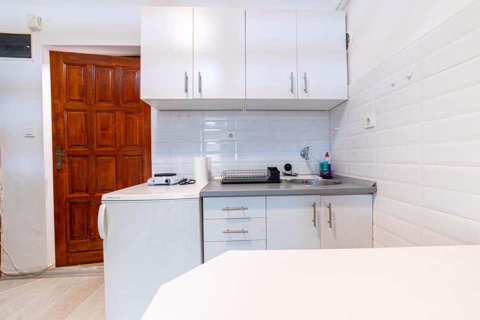 Kitchen or kitchenette, stove
