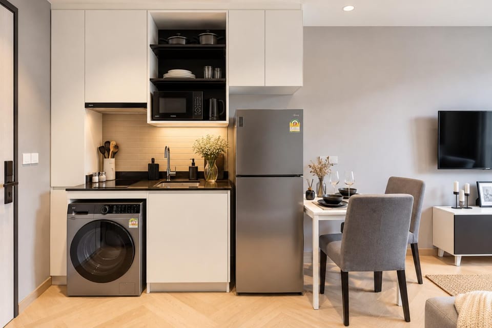 Coffee/tea facilities, Kitchen or kitchenette, Living room, Seating area, Dining area, washing machine