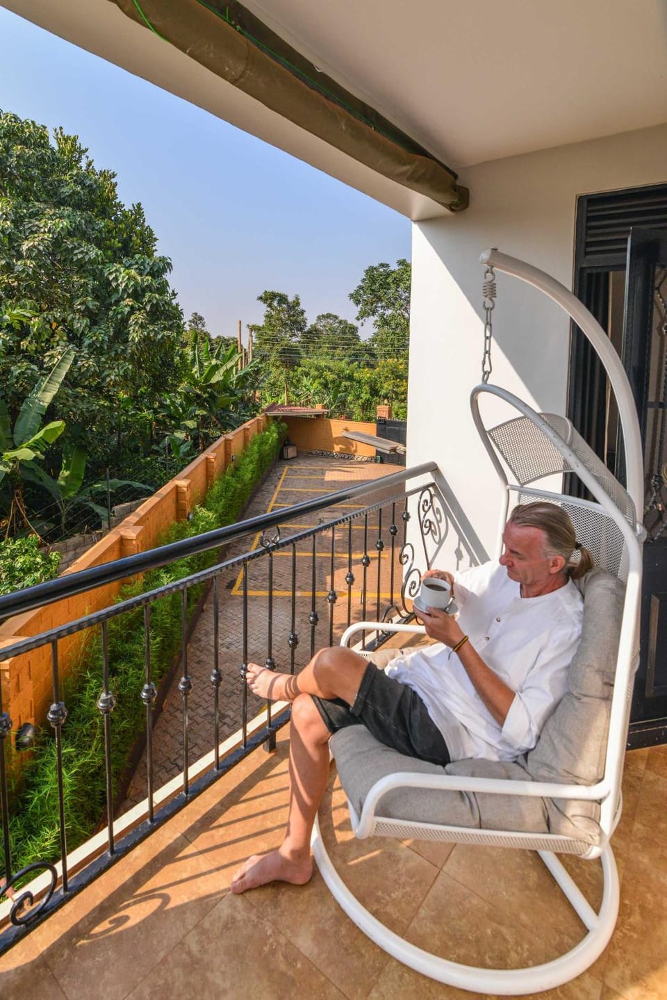Patio, People, Natural landscape, Balcony/Terrace, Seating area